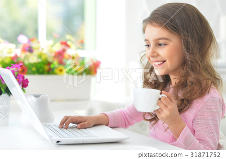 girl using modern laptop girl using modern laptop 31871752