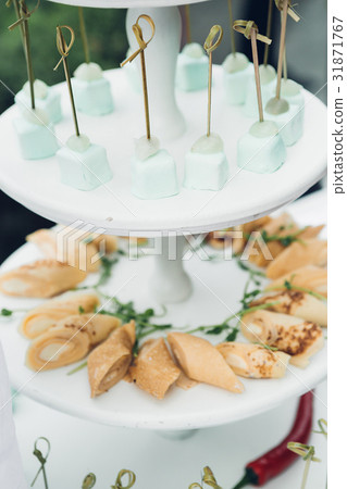 Candy bar on nature. Delicious cakes 31871767
