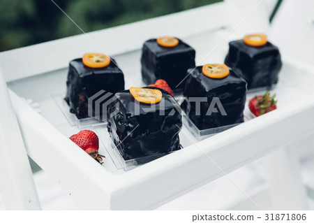 Candy bar on nature. Delicious cakes 31871806