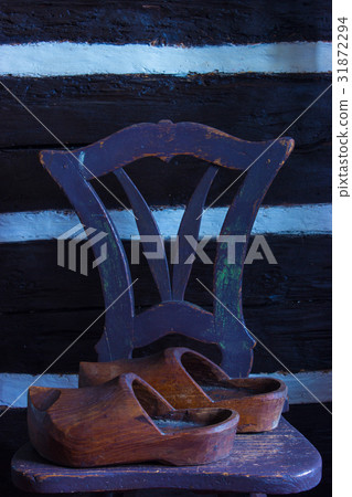 Old wooden shoes Old wooden shoes 31872294