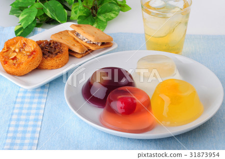 A collection of fruit jelly and baked confectionery A collection of fruit jelly and baked confectionery 31873954