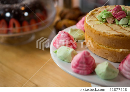 Cake served on plate in coffee house Cake served on plate in coffee house 31877328