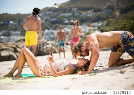 Romantic young couple at beach Romantic young couple at beach 31879513