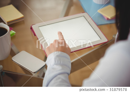 Close up of woman using tablet 31879578