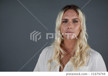 Portrait of beautiful transgender with blond hair 31879744
