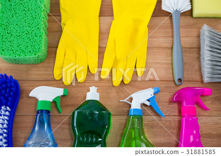 Overhead view of glove with cleaning equipment Overhead view of glove with cleaning equipment 31881585