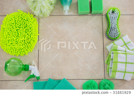 Overhead view of green cleaning products arranged floor Overhead view of green cleaning products arranged floor 31881929