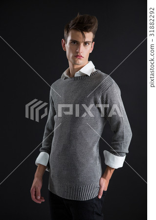 Androgynous man looking at camera 31882292