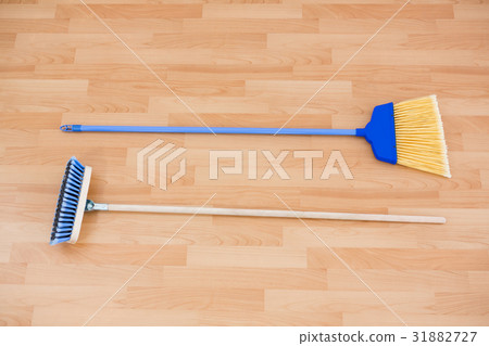 Hgh angle view of long handle brooms 31882727