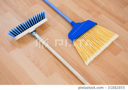 Close up of long handle brooms Close up of long handle brooms 31882855