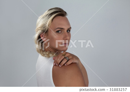 Portrait of transgender woman looking over shoulder 31883257
