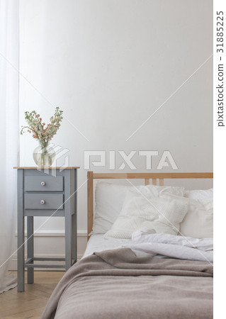 View of an unmade crumpled bed View of an unmade crumpled bed 31885225