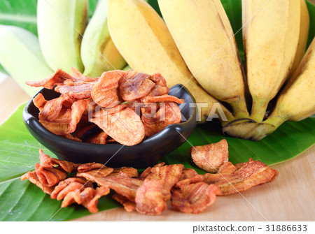 Fried ripe banana on wooden background Fried ripe banana on wooden background 31886633