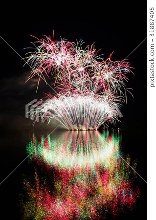 Firework.Beautiful colorful fireworks on the water Firework.Beautiful colorful fireworks on the water 31887408