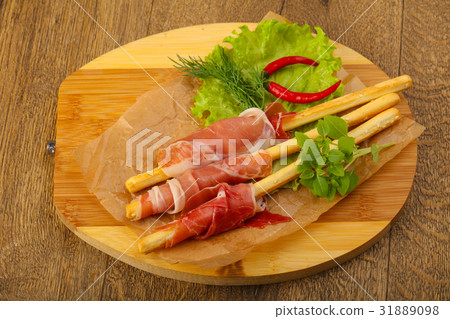 Bread sticks with serrano 31889098