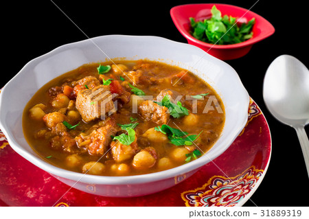 Moroccan soup harira with meat, chickpeas, lentils Moroccan soup harira with meat, chickpeas, lentils 31889319