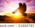 Silhouette of Dove carrying olive leaf branch 31889785