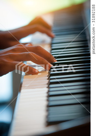 Pianist hands on the keyboard 31892188