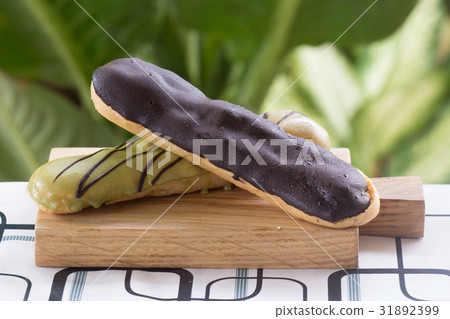 Green Tea and chocolate coating Eclair 31892399