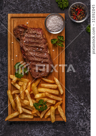 Beef barbecue steak with french fries. Beef barbecue steak with french fries. 31892845