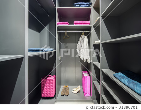 Stylish modern walk-in closet  31896701