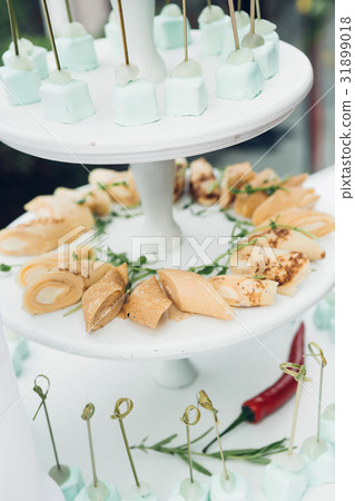 Candy bar on nature. Delicious cakes Candy bar on nature. Delicious cakes 31899018