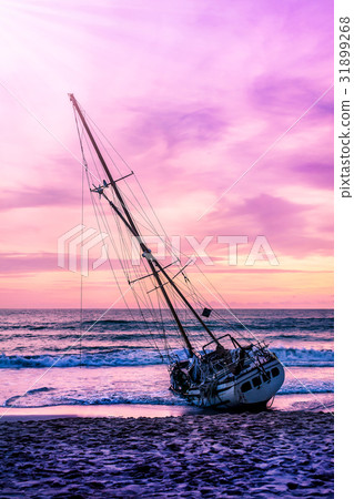 Boat on the beach in twilight and sunset 31899268