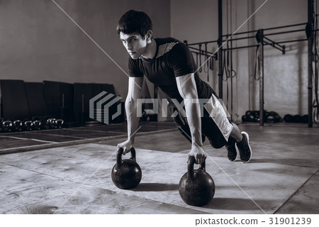 Handsome Strong man workout at gym, strength 31901239