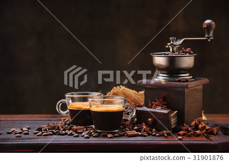 Coffee beans and grinder. 31901876
