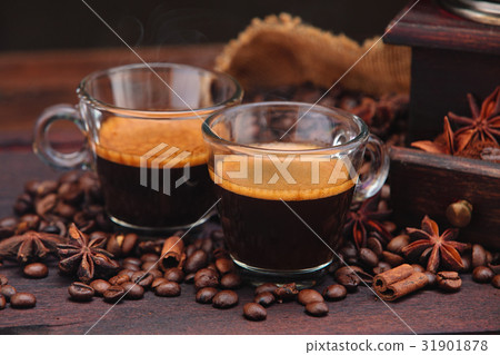 Coffee beans and grinder. 31901878