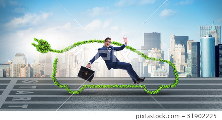 Businessman in green electric car concept 31902225