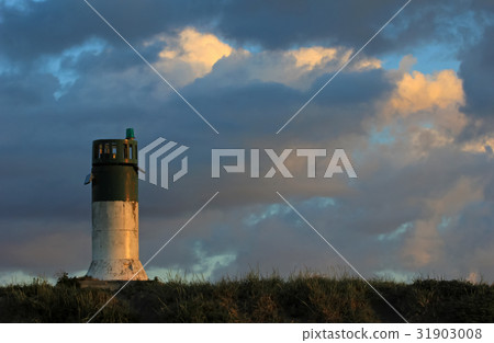 Lighthouse on the coast, beautiful gentle sunset Lighthouse on the coast, beautiful gentle sunset 31903008