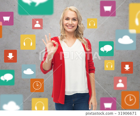 happy smiling young woman showing ok hand sign 31906671