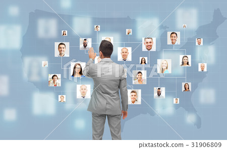 businessman touching virtual screen with contacts businessman touching virtual screen with contacts 31906809
