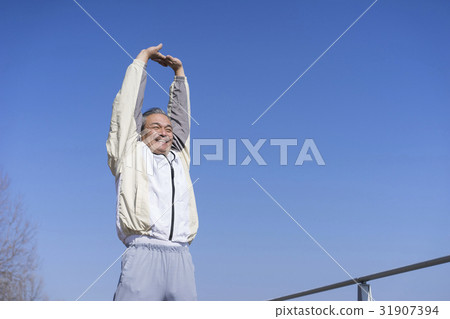 A man stretching A man stretching 31907394