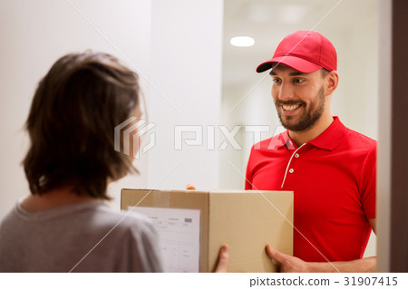 happy delivery man giving parcel box to customer happy delivery man giving parcel box to customer 31907415