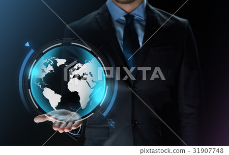 close up of businessman with earth projection 31907748