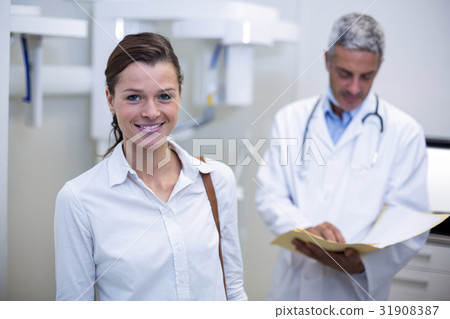 Female patient smiling at dental clinic 31908387