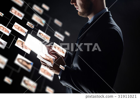 close up of businessman with transparent tablet pc 31911021