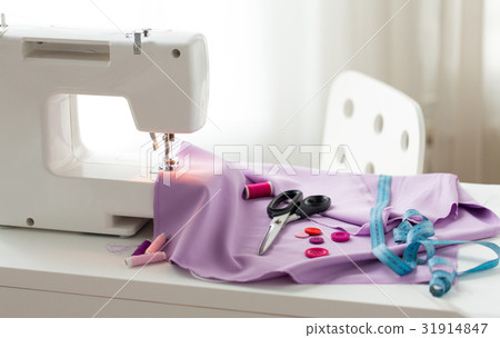 sewing machine, scissors, buttons and fabric sewing machine, scissors, buttons and fabric 31914847