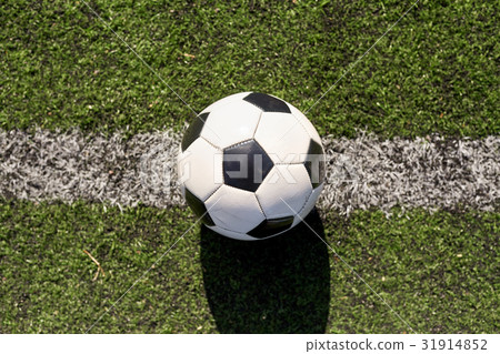soccer ball on football field marking line soccer ball on football field marking line 31914852