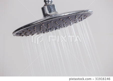 close up of rain shower head in bathroom close up of rain shower head in bathroom 31916146