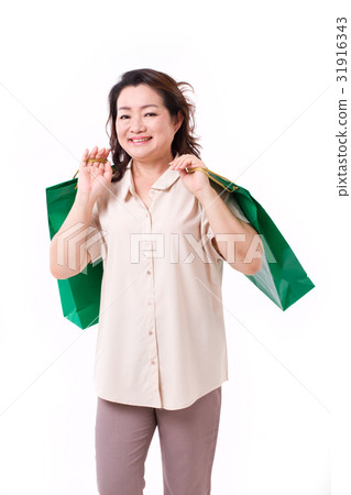 happy middle aged asian woman with shopping bag happy middle aged asian woman with shopping bag 31916343