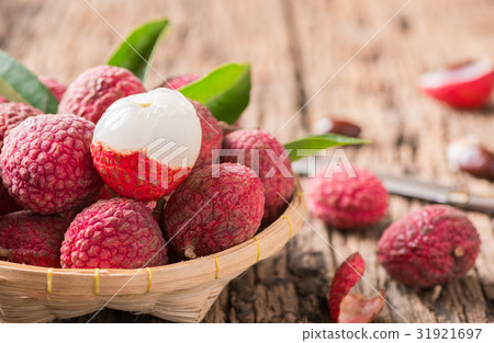fresh organic lychee fruit on basket 31921697