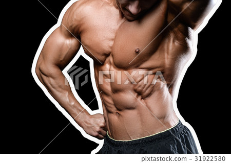 Caucasian sexy fitness model in gym close up abs. 31922580