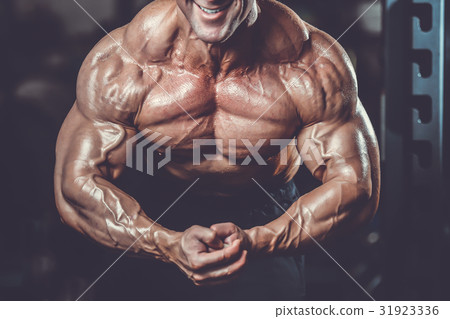 Brutal caucasian handsome fitness men on diet training chest pum 31923336