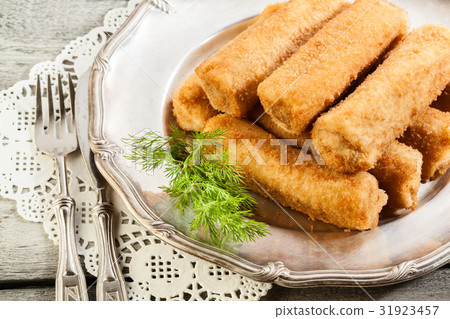 Delicious croquettes with meat on a plate 31923457