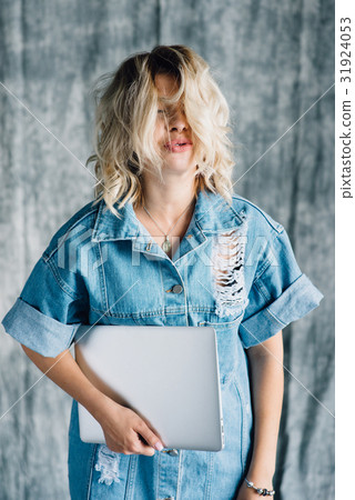 Cute pretty girl with laptop smiling 31924053