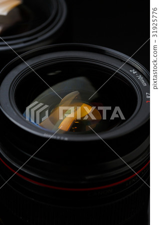 Photo of two camera lenses Photo of two camera lenses 31925776