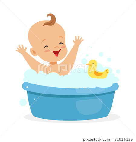 Happy baby taking a bath playing with foam bubbles 31926136